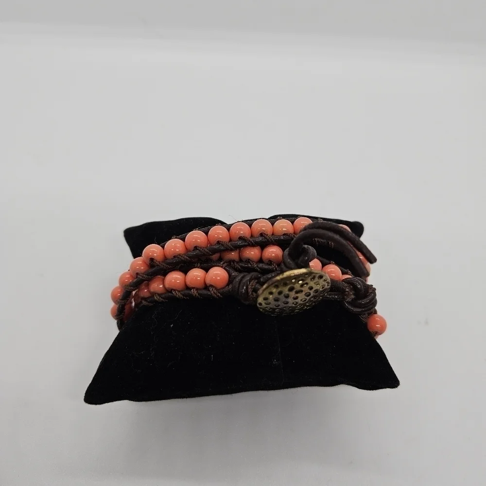 brown leather cord wrap bracelet with coral orange beads